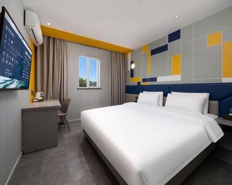 7Days Inn Changsha Wuyi Avenue Yunajialing Metro Station - Changsha - Yatak Odası