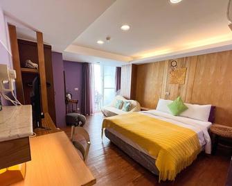 Tz Shin Resort Hostel - Hengchun Township - Camera da letto