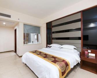 Dongfang Tanggula Hotel (High-speed Railway Station) - Dongfang - Habitación
