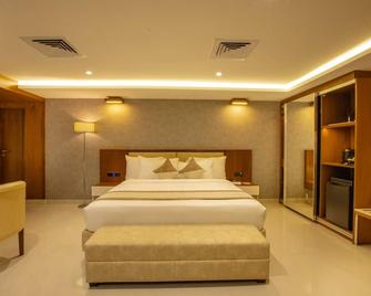 Royal Plaza Suites By Rak Rooms - Mangalore - Slaapkamer