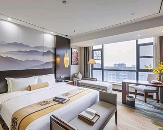 Yipin International Hotel - Nanyang - Schlafzimmer