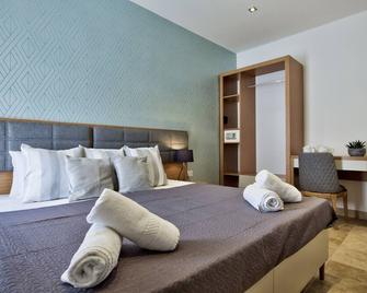 Ursula suites - self catering apartments - Valletta - By Tritoni Hotels - Valletta - Slaapkamer
