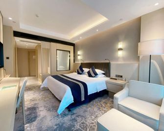 تشونجتشينج ليوان هوتل - تشونغتشينغ - غرفة نوم