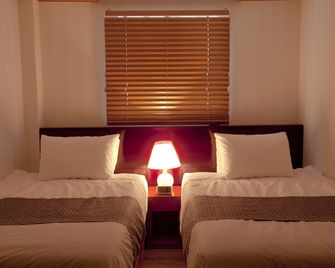 Hotel Daewoo Inn - סיאול - חדר שינה