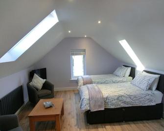 The Hollies on the Wall - Carlisle - Bedroom