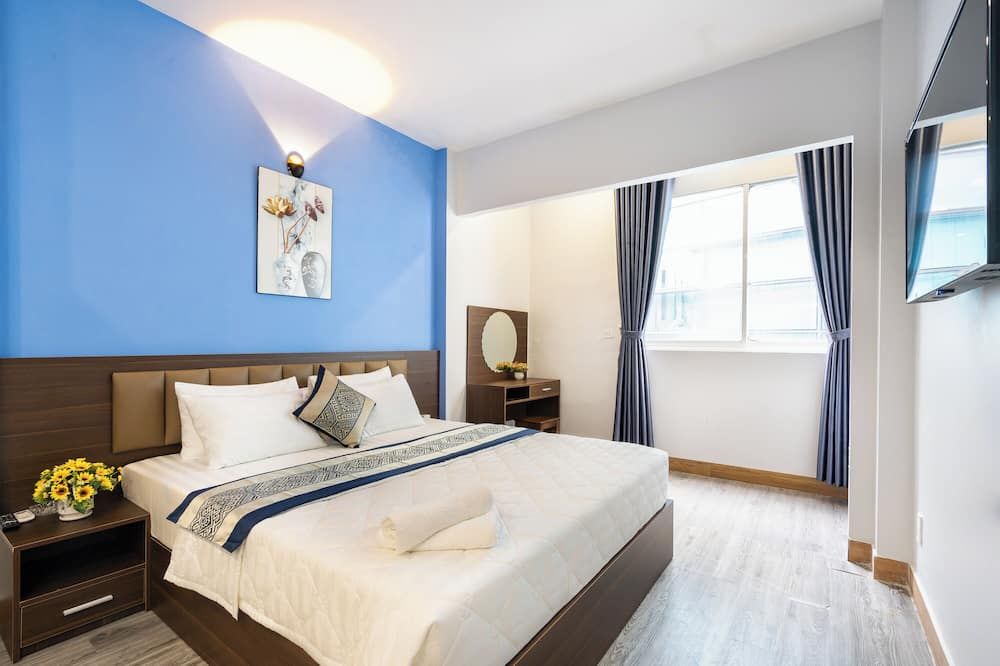 جرين إيربورت هوتل - هوتشي مين سيتي - غرفة نوم