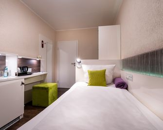 Hotel Stadt Heidelberg - דארמשטאט - חדר שינה