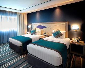 Al Sarab Hotel - Dubai - Bedroom