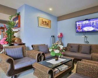 Maesai Orchid Hotel - Mae Sai - Wohnzimmer