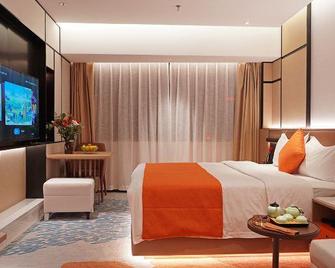 Zhaotong Purple Light Hotel - Zhaotong - Habitación