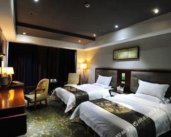 Peng Yu Carlton International Hotel - Zhumadian - Bedroom
