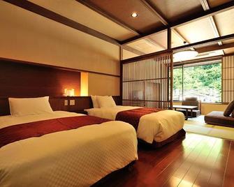 Matsunoyama Onsen Hinanoyado Chitose - Tokamachi - Ložnice