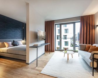 ipartment Darmstadt @HOME by Best Western - Дармштадт - Спальня