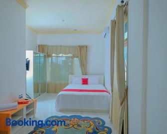 RedDoorz Syariah near Museum Lambung Mangkurat 2 - Banjarbaru - Bedroom