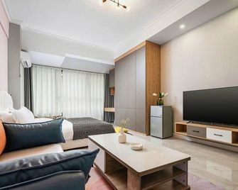 Starry Night Cinema Hotel (Dayangshu Branch) - Jiaozuo - Living room