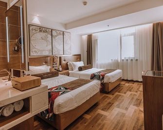 James Joyce Coffetel Qingdao Taidong Pedestrian Street Yingkou Road - Qingdao - Habitación