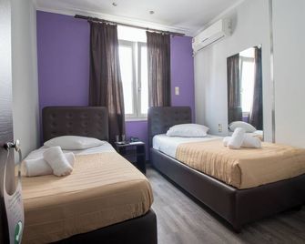 Cosmopolit - אתונה - חדר שינה