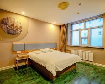Home Inn (Daqing New Village Keji Road Passenger Terminal) - Дакінг - Спальня