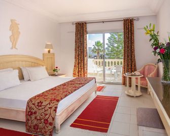 Zodiac Hôtel & Aqua Park - חמאמט - חדר שינה