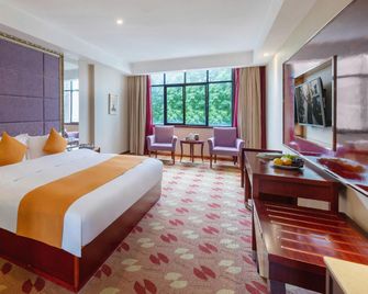 Jinting Chain. Via Boutique Hotel (Deyang Moore Shopping Plaza) - Deyang - Habitación