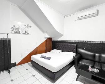 Modom Residence - Yakarta - Habitación