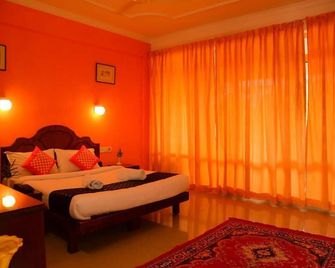 Oceanbay Ayurvedic Beach Resort - טריבאנדרום - חדר שינה