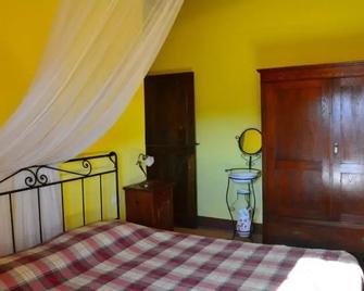 Agriturismo Casale Poggio Colpiccione - Passignano sul Trasimeno - Slaapkamer