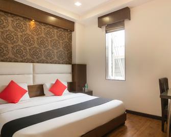 Hotel O Parktel - Ghaziabad - Schlafzimmer