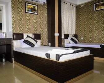 Hotel Biswanath - Guwahati - Bedroom