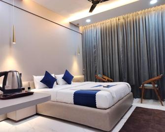 Hotel Laxmi Elite - Karād - Habitación