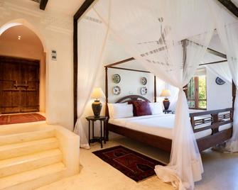 Qambani Luxury Resort - Pingwe - Schlafzimmer