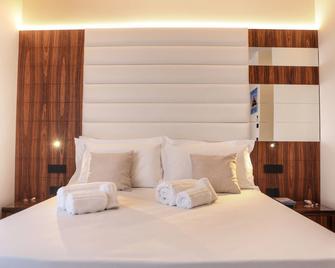 Le Soleil B&B - ميلاتسو - غرفة نوم