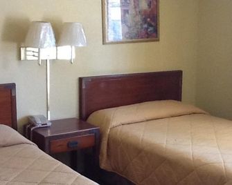 Travelers Motel - ג'קסון - חדר שינה