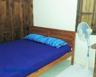 Griya Harja Homestay - Borobudur - Slaapkamer