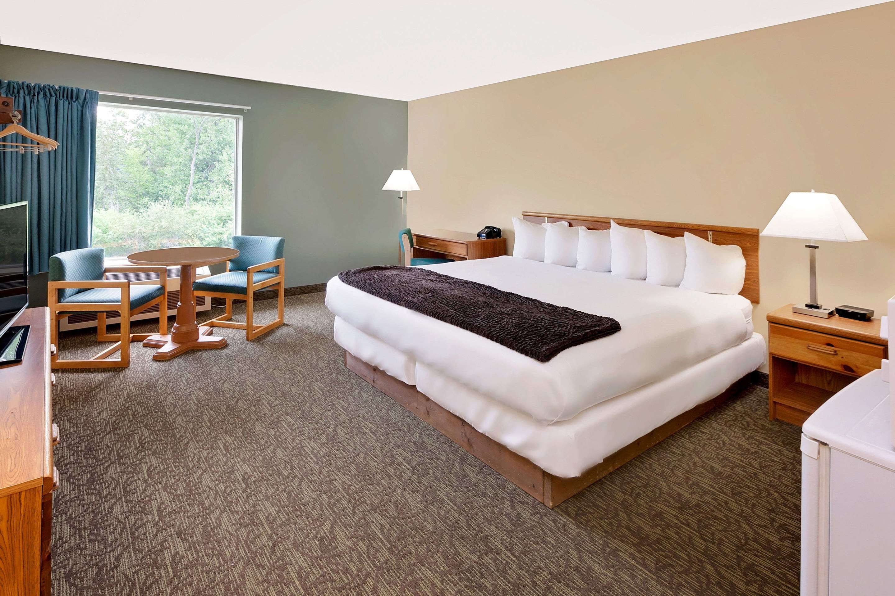 Bedroom view of Days Inn by Wyndham Cadillac