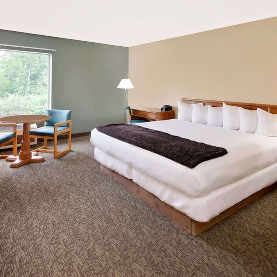 Bedroom view of Days Inn by Wyndham Cadillac