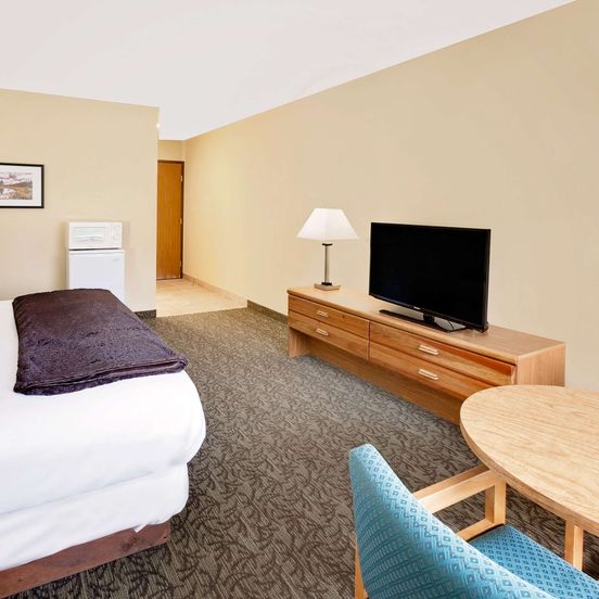 Living room view of Days Inn by Wyndham Cadillac