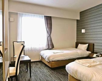 Hotel Paradise Inn Saza Inter - Sasebo - Slaapkamer