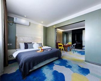 Zijun Fashion Hotel - Zhengzhou - Bedroom