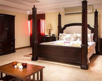 Cattleya Hotel - Tunapuna - Bedroom
