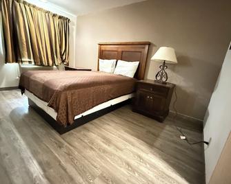 Island Inn - Grand Island - Habitación
