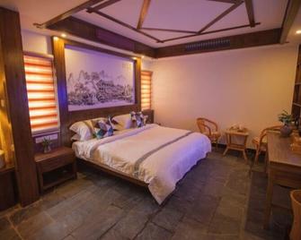 The Longmen One Inn - Zhangjiajie - Bedroom
