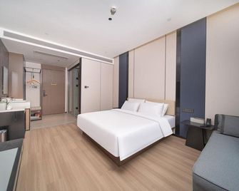 Atour Hotel Urumqi Hongshan Park Yangzijiang Road - أورومتشي - غرفة نوم