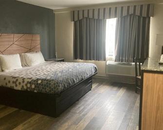 Howard Johnson by Wyndham Malden Boston Area - Malden - Schlafzimmer