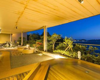 Toba Seaside Hotel - Toba - Balcon