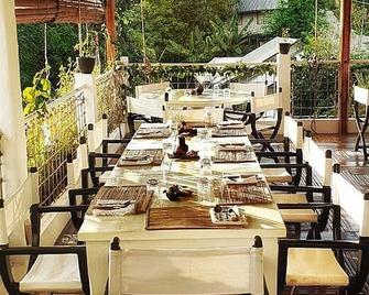 Marina 4Rooms - San Vicente - Ristorante