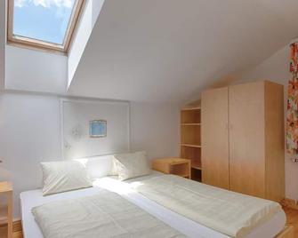 Holiday apartment W 12 /2 bedrooms/bathroom, W - holiday house Hotel Post - Grosskirchheim - Slaapkamer