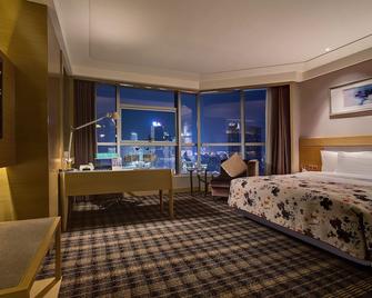 جراند منور إنترناشيونال هوتل نانتشانج - نانتشانغ - غرفة نوم