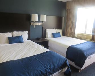 Howard Johnson by Wyndham Odessa TX - אודסה - חדר שינה