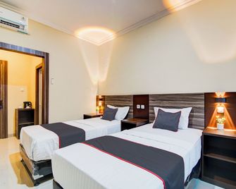 كوليكشن أو بوسات كوتا بيكانبارو نير روما ساكيت بريما فورميرلي كينجز هوم ستاي - بيكانبارو - غرفة نوم